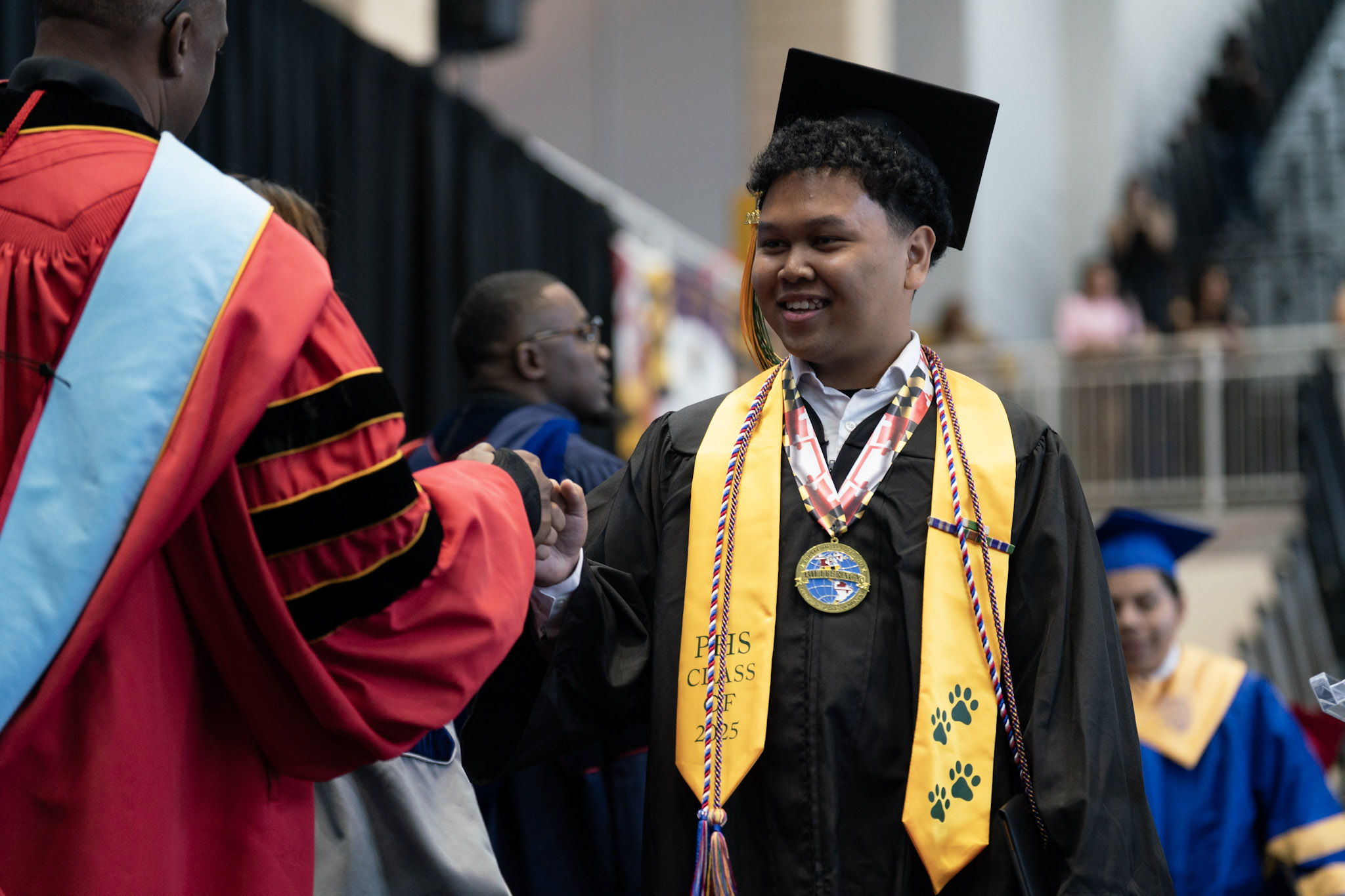 2025 girl graduate shaking hands