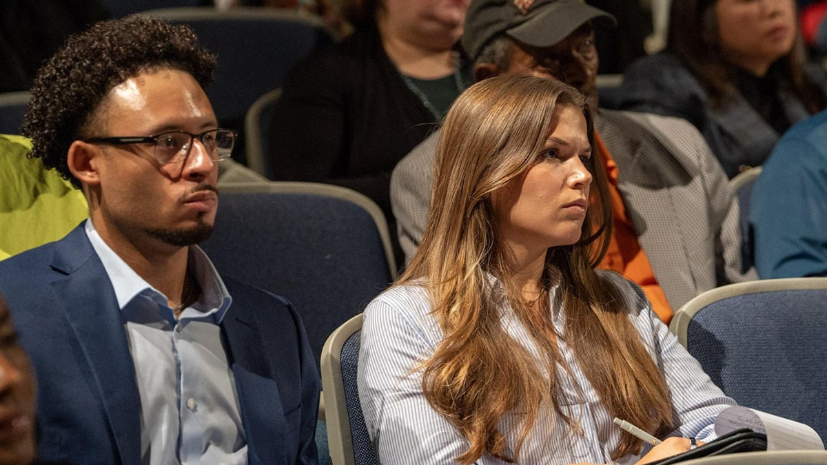 attendees-listening-at-Education-Marketplace-presentation