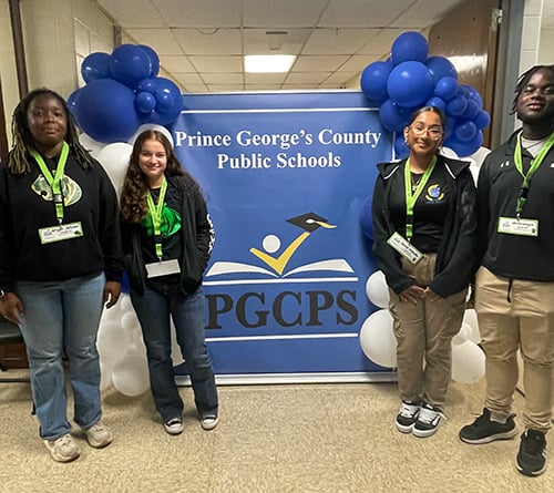 students-in-front-of-PGCPS-banner