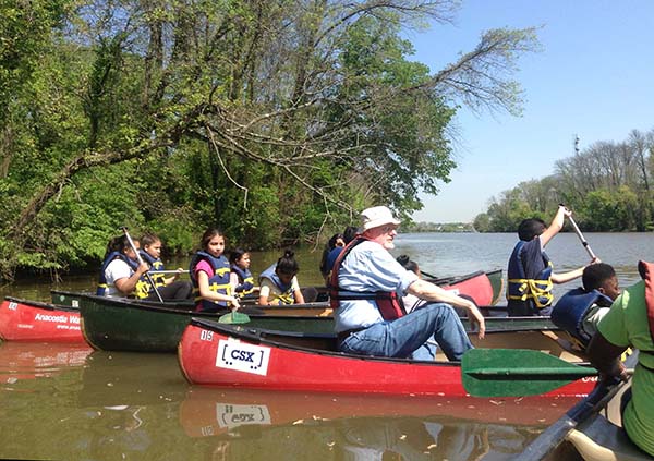 students-and-teachers-paddling-in-canoes.jpg
