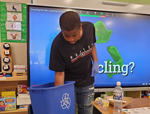 S-Rieg-Green-Initiative-student-sorting-recycling.jpg