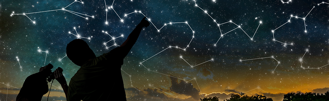 adult-child-observing-constellations-with-binoculars