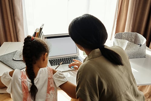 child-and-adult-with-computer